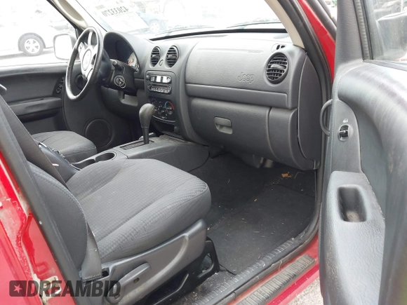 2003 Jeep Liberty Sport with VIN 1J4GL48K03W608325, listed as a IAAI auction lot 42033270 with 210,609 mi miles. Bid and sale history available at carsss.com. Image 5.