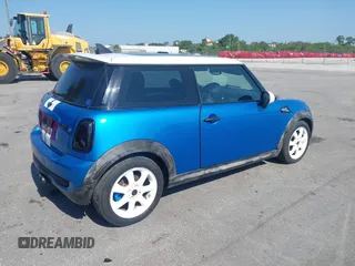2009 MINI Hardtop S with VIN WMWMF73539TT95350, listed as a IAAI auction lot 42196663 with 75,593 mi miles and . Bid and sale history available at DreamBid. Image 4.