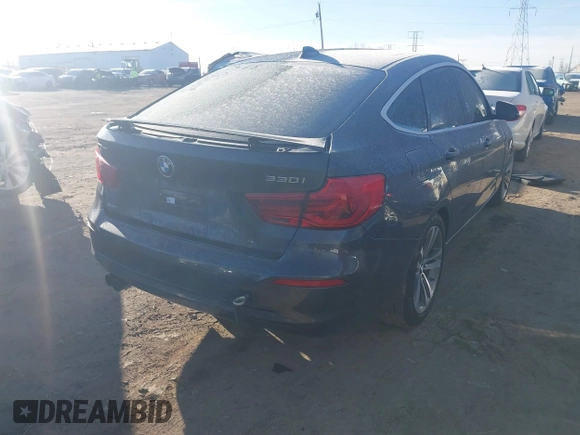 2018 BMW 3 Series 330i xDrive with VIN WBA8Z9C58JG827772, listed as a IAAI auction lot 41542464 with 56,386 mi miles. Bid and sale history available at carsss.com. Image 4.