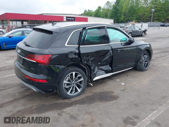 2021 Audi Q5 Premium with VIN WA1AAAFY2M2008206, listed as a IAAI auction lot 42129096 with 65,686 mi miles and . Bid and sale history available at DreamBid. Image 4.