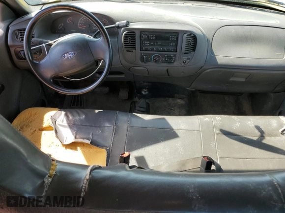 2003 Ford F-150 XL z VIN 2FTRX18W53CA92348, wystawiony jako Copart lot #56222285 z przebiegiem 266 068 mil mil oraz Szkoda całkowita • Salvage title. Historia ofert i sprzedaży dostępna na DreamBid. Obrazek 8.