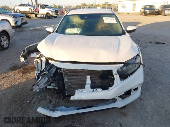 2019 Honda Civic LX with VIN 19XFC2F61KE014007, listed as a IAAI auction lot 41795070 with 64,259 mi miles and . Bid and sale history available at DreamBid. Image 6.