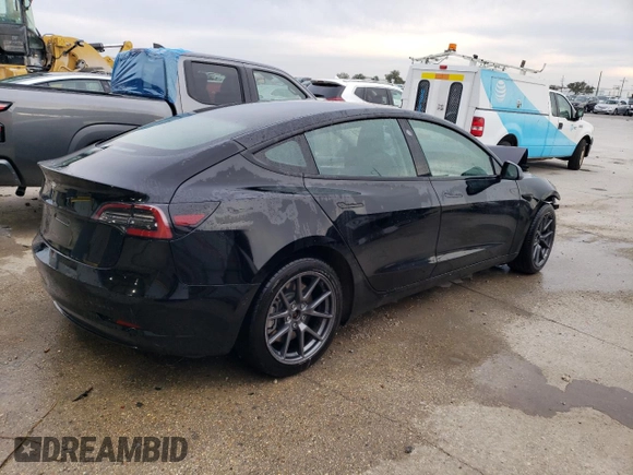 2022 Tesla Model 3 with VIN 5YJ3E1EA6NF188263, listed as a Copart auction lot 77542203 with 75,461 mi miles and Non Repairable. Bid and sale history available at DreamBid. Image 3.