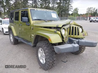 2007 Jeep Wrangler Unlimited Sahara z VIN 1J8GA59167L128166, wystawiony jako IAAI lot #42082874 z przebiegiem 146 430 mil mil oraz . Historia ofert i sprzedaży dostępna na DreamBid. Obrazek 1.