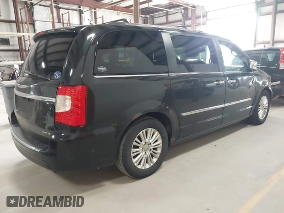 2013 Chrysler Town & Country Limited with VIN 2C4RC1GG0DR509167, listed as a IAAI auction lot 41973819 with 186,896 mi miles. Bid and sale history available at carsss.com. Image 4.