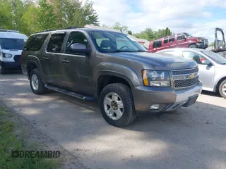 2012 Chevrolet Suburban LT z VIN 1GNSKJE74CR221767, wystawiony jako IAAI lot #42340815 z przebiegiem 219 966 mil mil oraz . Historia ofert i sprzedaży dostępna na DreamBid. Obrazek 1.