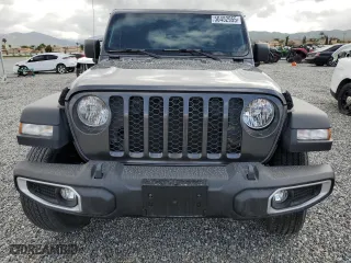 2023 Jeep Gladiator Freedom with VIN 1C6JJTAG9PL557861, listed as a Copart auction lot 50452955 with 44,716 mi miles and Salvage Title. Bid and sale history available at carsss.com. Image 5.