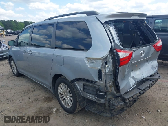 2015 Toyota Sienna XLE with VIN 5TDYK3DC9FS532310, listed as a IAAI auction lot 41990553 with 75,133 mi miles and . Bid and sale history available at DreamBid. Image 3.
