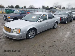 2002 Cadillac DeVille DTS with VIN 1G6KF57992U220129, listed as a IAAI auction lot 41426014 with 1 mi miles. Bid and sale history available at carsss.com. Image 2.