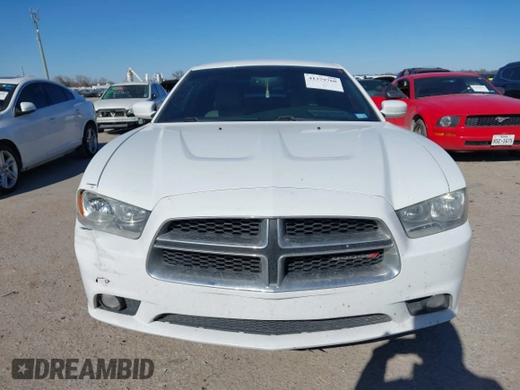 2014 Dodge Charger SXT with VIN 2C3CDXHG2EH104640, listed as a IAAI auction lot 41379760 with 122,664 mi miles and . Bid and sale history available at DreamBid. Image 12.