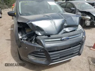 2016 Ford Escape SE with VIN 1FMCU9G99GUA33121, listed as a IAAI auction lot 37495107 with 107,366 mi miles. Bid and sale history available at carsss.com. Image 6.