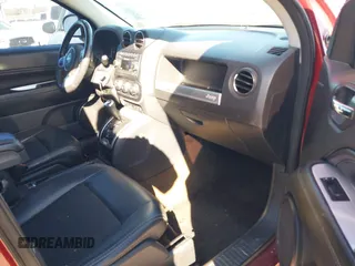 2016 Jeep Compass Latitude with VIN 1C4NJDEB1GD662807, listed as a IAAI auction lot 41161996 with 128,030 mi miles. Bid and sale history available at carsss.com. Image 5.