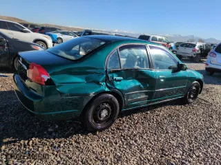 2001 Honda Civic EX with VIN 2HGES26761H602898, listed as a Copart auction lot 50371535 with 148,669 mi miles and Salvage Title. Bid and sale history available at carsss.com. Image 3.