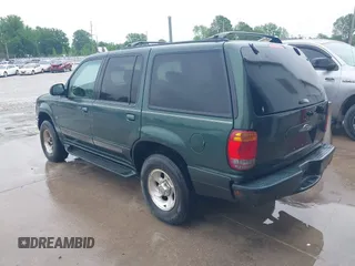 1998 Ford Explorer XLT z VIN 1FMZU35P1WZA75454, wystawiony jako IAAI lot #42360349 z przebiegiem 169 560 mil mil oraz . Historia ofert i sprzedaży dostępna na DreamBid. Obrazek 3.