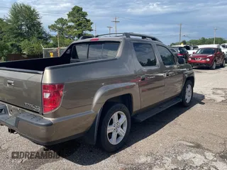 2009 Honda Ridgeline RTL with VIN 2HJYK16539H500759, listed as a Copart auction lot 63874225 with 123,508 mi miles and Clean title. Bid and sale history available at DreamBid. Image 4.