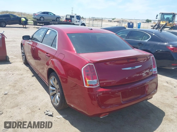 2014 Chrysler 300 with VIN 2C3CCABT2EH157487, listed as a IAAI auction lot 40127984 with 82,957 mi miles. Bid and sale history available at carsss.com. Image 3.