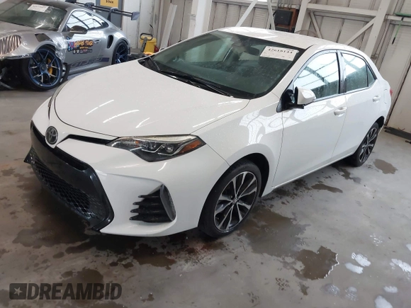2017 Toyota Corolla L z VIN 2T1BURHE9HC784195, wystawiony jako IAAI lot #42618144 z przebiegiem 85 568 mil mil oraz . Historia ofert i sprzedaży dostępna na DreamBid. Obrazek 17.