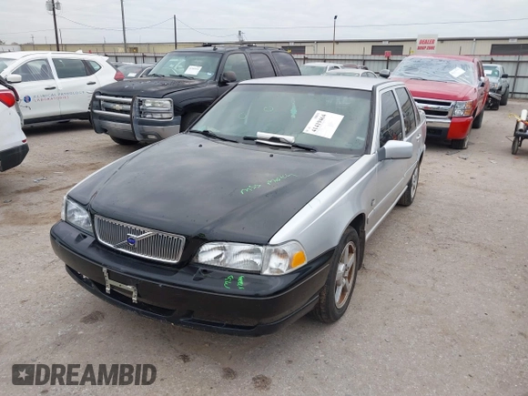 1999 Volvo S70 z VIN YV1LS55A1X1602832, wystawiony jako IAAI lot #41419464 z przebiegiem 243 610 mil mil oraz . Historia ofert i sprzedaży dostępna na DreamBid. Obrazek 2.