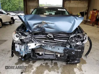 2016 Mazda CX-5 Sport z VIN JM3KE4BY0G0628372, wystawiony jako Copart lot #57534785 z przebiegiem 152 487 mil mil oraz Szkoda całkowita • Salvage title. Historia ofert i sprzedaży dostępna na DreamBid. Obrazek 5.