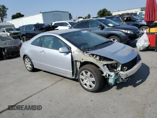2010 Honda Civic Cpe LX with VIN 2HGFG1B6XAH523795, listed as a Copart auction lot 64898464 with 28,863 mi miles and Salvage Title. Bid and sale history available at carsss.com. Image 4.