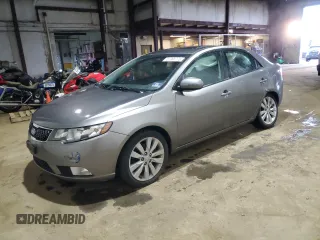 2012 Kia Forte SX with VIN KNAFW4A35C5490335, listed as a Copart auction lot 51386775 with 38,713 mi miles and Salvage Title. Bid and sale history available at carsss.com. Image 1.