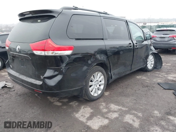 2014 Toyota Sienna Ltd with VIN 5TDDK3DCXES076542, listed as a IAAI auction lot 41559021 with 1 mi miles. Bid and sale history available at carsss.com. Image 4.