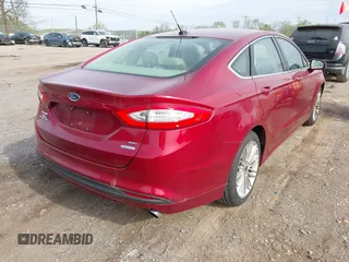 2014 Ford Fusion SE with VIN 3FA6P0HD6ER198299, listed as a IAAI auction lot 42020385 with 128,669 mi miles. Bid and sale history available at carsss.com. Image 4.