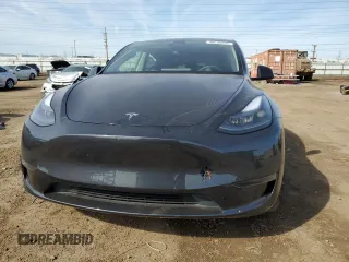 2024 Tesla Model Y with VIN 7SAYGDED7RF163537, listed as a Copart auction lot 48639255 with 7,193 mi miles and Salvage Title. Bid and sale history available at DreamBid. Image 5.
