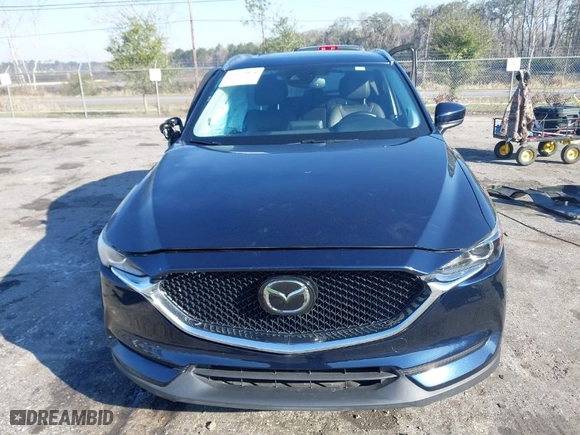 2019 Mazda CX-5 Touring with VIN JM3KFACM5K1608354, listed as a IAAI auction lot 41675828 with NaN miles. Bid and sale history available at carsss.com. Image 12.