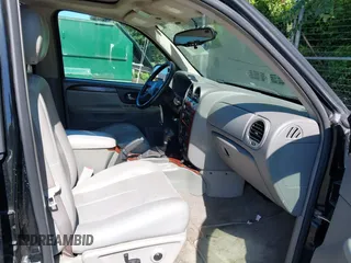 2005 GMC Envoy SLE with VIN 1GKDS13S452208252, listed as a IAAI auction lot 42357457 with 197,419 mi miles and . Bid and sale history available at DreamBid. Image 5.