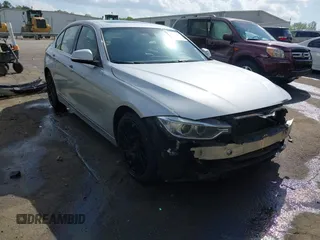 2015 BMW 3 Series 328i with VIN WBA3A5G54FNS83410, listed as a IAAI auction lot 41942681 with 115,340 mi miles. Bid and sale history available at carsss.com. Image 1.