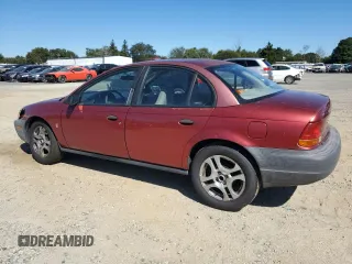 1998 Saturn SL z VIN 1G8ZH528XWZ144301, wystawiony jako Copart lot #75918414 z przebiegiem 219 256 mil mil oraz Szkoda całkowita • Salvage title. Historia ofert i sprzedaży dostępna na DreamBid. Obrazek 2.