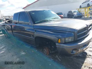 1999 Dodge Ram 2500 with VIN 3B7KF2367XG174415, listed as a IAAI auction lot 41662623 with 260,853 mi miles. Bid and sale history available at carsss.com. Image 1.
