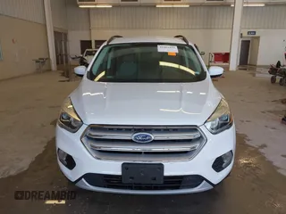 2017 Ford Escape SE z VIN 1FMCU0GD3HUC12658, wystawiony jako IAAI lot #41801033 z przebiegiem 107 662 mil mil oraz . Historia ofert i sprzedaży dostępna na DreamBid. Obrazek 12.