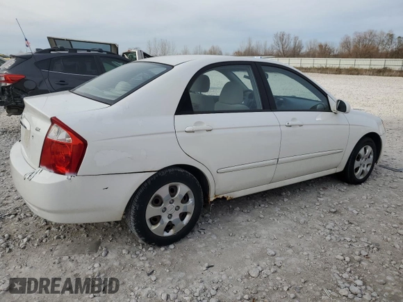 2006 Kia Spectra EX with VIN KNAFE121265208526, listed as a Copart auction lot 80300604 with 101,780 mi miles and Salvage Title. Bid and sale history available at carsss.com. Image 3.