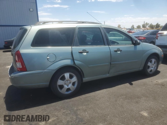 2004 Ford Focus SE with VIN 1FAFP36384W191801, listed as a Copart auction lot 63661465 with 144,226 mi miles and Salvage title. Bid and sale history available at DreamBid. Image 3.