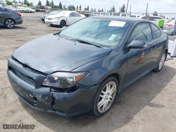 2006 Scion tC with VIN JTKDE177260081483, listed as a IAAI auction lot 42076072 with 156,556 mi miles. Bid and sale history available at carsss.com. Image 23.