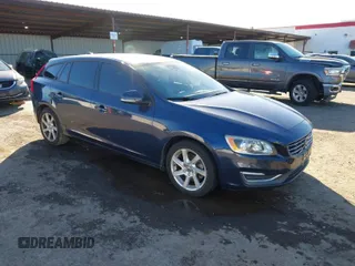 2015 Volvo V60 T5 Drive-E with VIN YV140MEJ8F1261268, listed as a IAAI auction lot 41517740 with 112,991 mi miles. Bid and sale history available at carsss.com. Image 1.