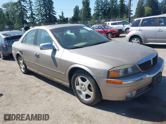 2000 Lincoln LS z VIN 1LNHM86S9YY852483, wystawiony jako IAAI lot #42292141 z przebiegiem 126 347 mil mil oraz . Historia ofert i sprzedaży dostępna na DreamBid. Obrazek 1.