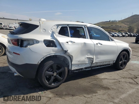 2018 BMW X2 sDrive28i with VIN WBXYJ3C34JEJ84163, listed as a Copart auction lot 54043904 with 46,509 mi miles and Salvage title. Bid and sale history available at DreamBid. Image 3.