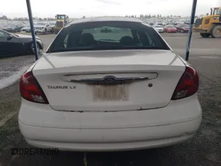 2003 Ford Taurus LX Standard with VIN 1FAFP52U53G280700, listed as a Copart auction lot 87488014 with 128,020 mi miles and Salvage title. Bid and sale history available at DreamBid. Image 6.