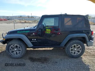 2009 Jeep Wrangler X with VIN 1J4FA24159L768617, listed as a IAAI auction lot 41686830 with 100,478 mi miles and . Bid and sale history available at DreamBid. Image 14.