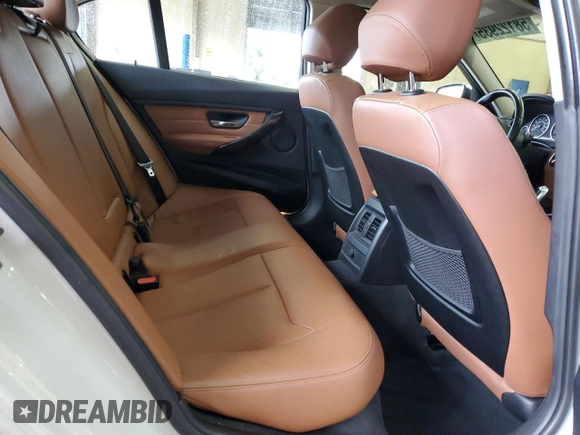 2013 BMW 3 Series 328i with VIN WBA3A5G52DNP18972, listed as a Copart auction lot 58122935 with 209,173 mi miles and Salvage title. Bid and sale history available at DreamBid. Image 11.