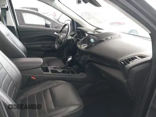 2018 Ford Escape Titanium with VIN 1FMCU0J98JUA03474, listed as a IAAI auction lot 37677880 with 106,423 mi miles and . Bid and sale history available at DreamBid. Image 5.