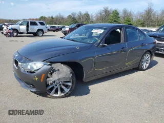 2017 BMW 3 Series 320i xDrive with VIN WBA8A3C32HK692959, listed as a Copart auction lot 66175475 with 62,050 mi miles and Salvage title. Bid and sale history available at DreamBid. Image 1.