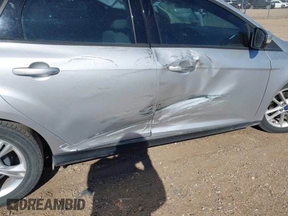 2017 Ford Focus SE with VIN 1FADP3F29HL263353, listed as a IAAI auction lot 41945763 with 116,866 mi miles and . Bid and sale history available at DreamBid. Image 6.