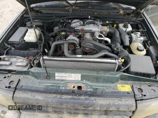2003 Land Rover Discovery SE z VIN SALTW16463A823650, wystawiony jako Copart lot #52258595 z przebiegiem 194 038 mil mil oraz Szkody całkowita. Historia ofert i sprzedaży dostępna na DreamBid. Obrazek 13.
