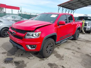 2018 Chevrolet Colorado 4WD Z71 z VIN 1GCGTDEN8J1141945, wystawiony jako IAAI lot #41837680 z przebiegiem 67 686 mil mil oraz . Historia ofert i sprzedaży dostępna na DreamBid. Obrazek 18.