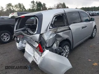 2011 Honda Odyssey LX with VIN 5FNRL5H29BB010256, listed as a IAAI auction lot 40931367 with Not provided miles and . Bid and sale history available at DreamBid. Image 4.