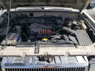 1994 Isuzu Trooper z VIN JACDH58V7R7929502, wystawiony jako Copart lot #70280554 z przebiegiem 243 827 mil mil oraz Tytuł czysty. Historia ofert i sprzedaży dostępna na DreamBid. Obrazek 12.
